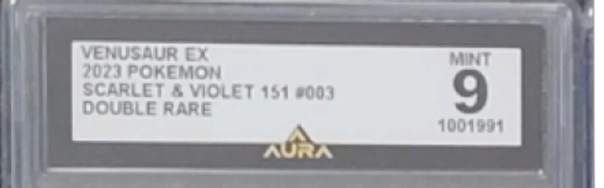 Close view of the front label on a Aura Grading slab
