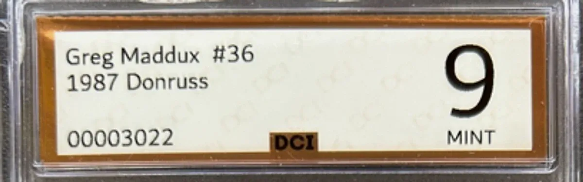 Close view of the front label on a DCI Grading (Dallas Card Investors) slab