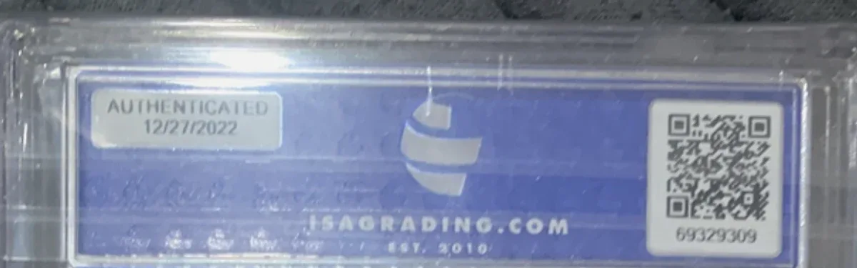 Close view of the back label on a ISA (International Sports Authentication) slab
