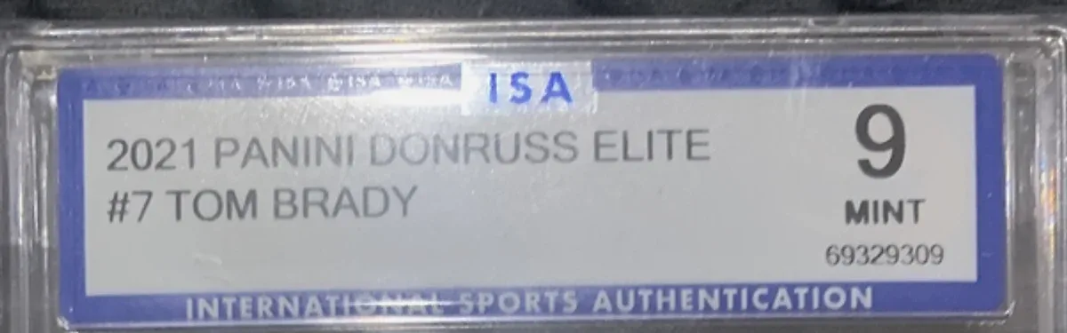 Close view of the front label on a ISA (International Sports Authentication) slab