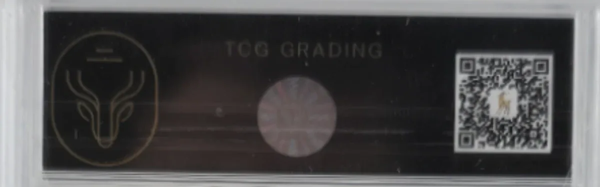 Close view of the back label on a TCG (Trading Card Grading) slab