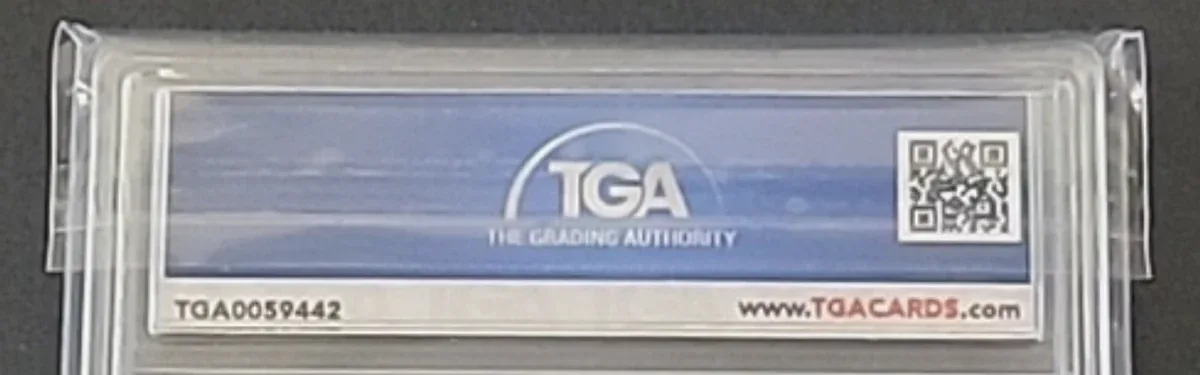 Close view of the back label on a TGA (True Grade Authentication) slab